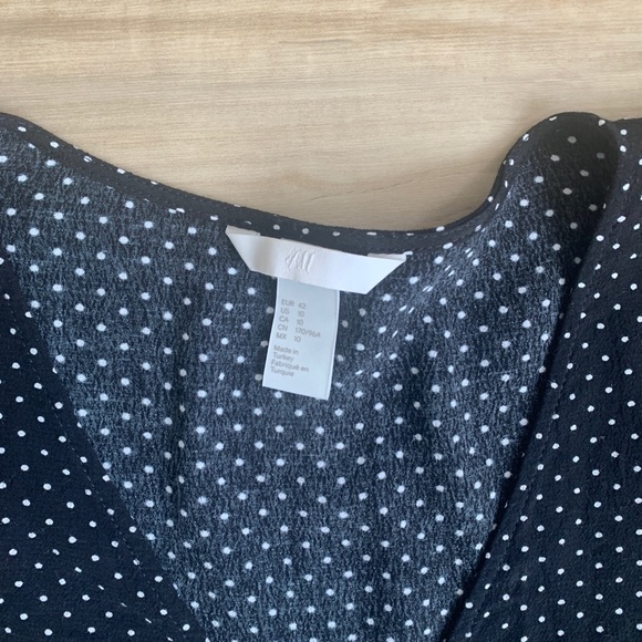 Polka-dot Peplum Top - Picture 2 of 3